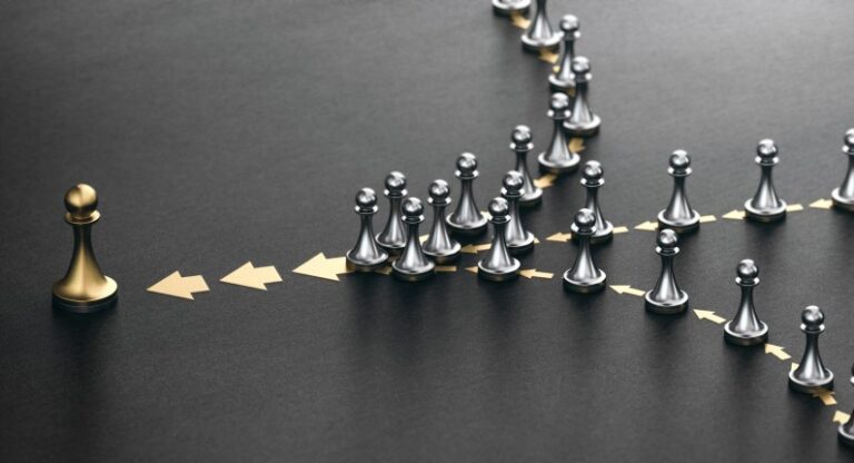 Chess pieces converging and moving in the same direction