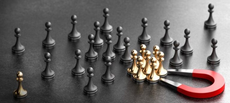 Chess pieces positioned along a marked path on a dark surface
